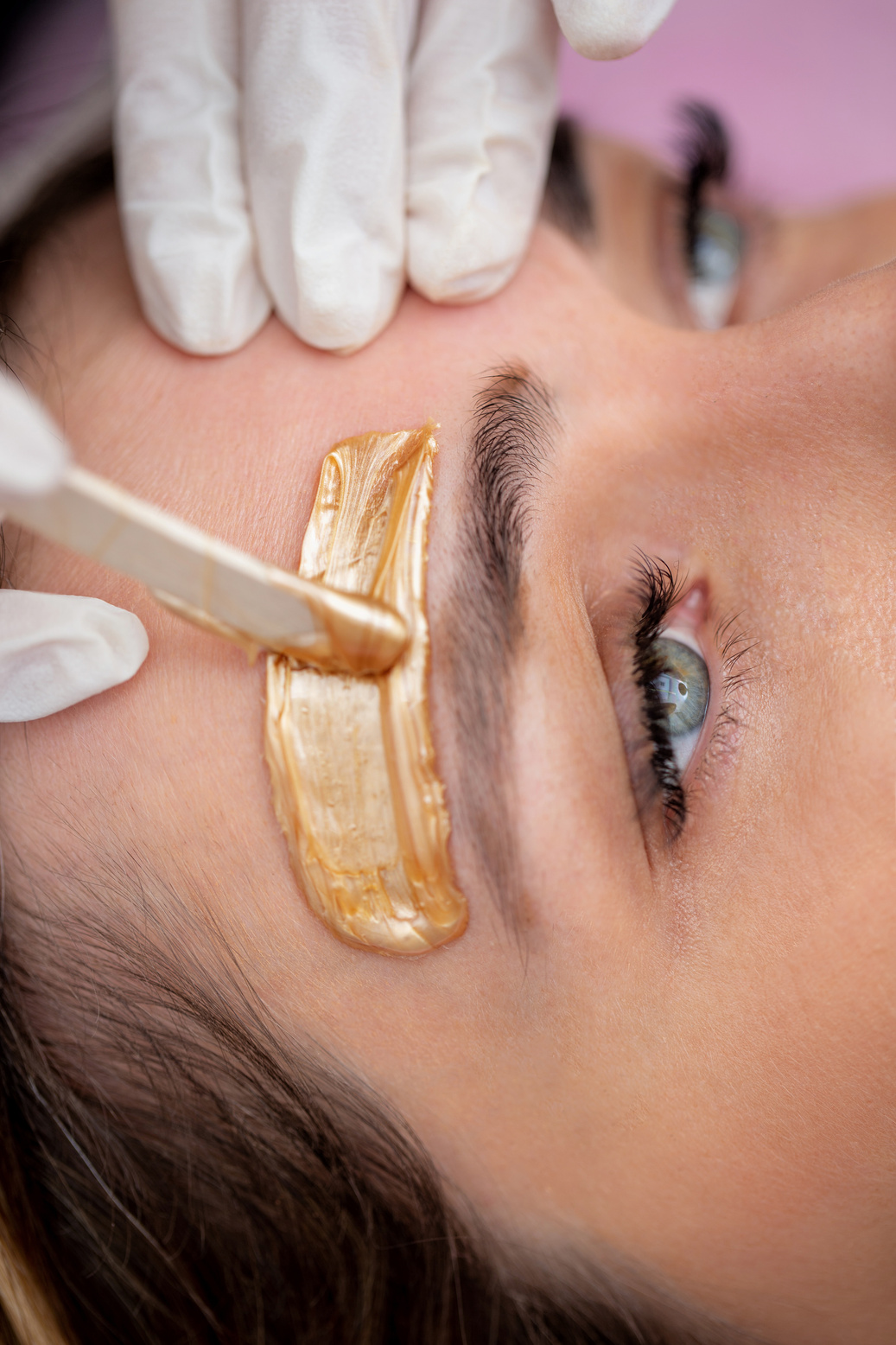 Woman Getting Eyebrow Waxing - stock photo
